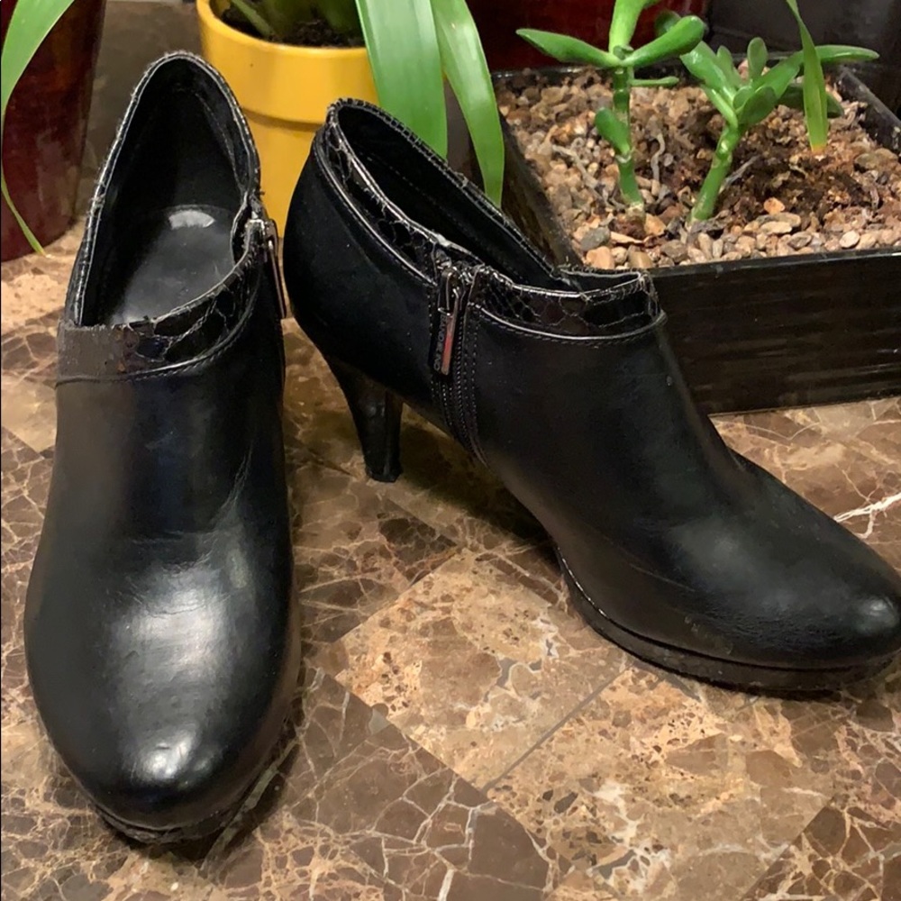 Black heeled bootie with faux snakeskin design